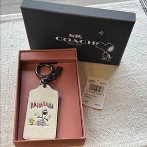 Coach White and Black Snoopy Keychain